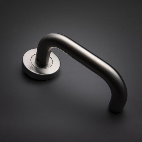 Béquille double sur rosace bec de cane JADE série 1294 - Inox - Courbée